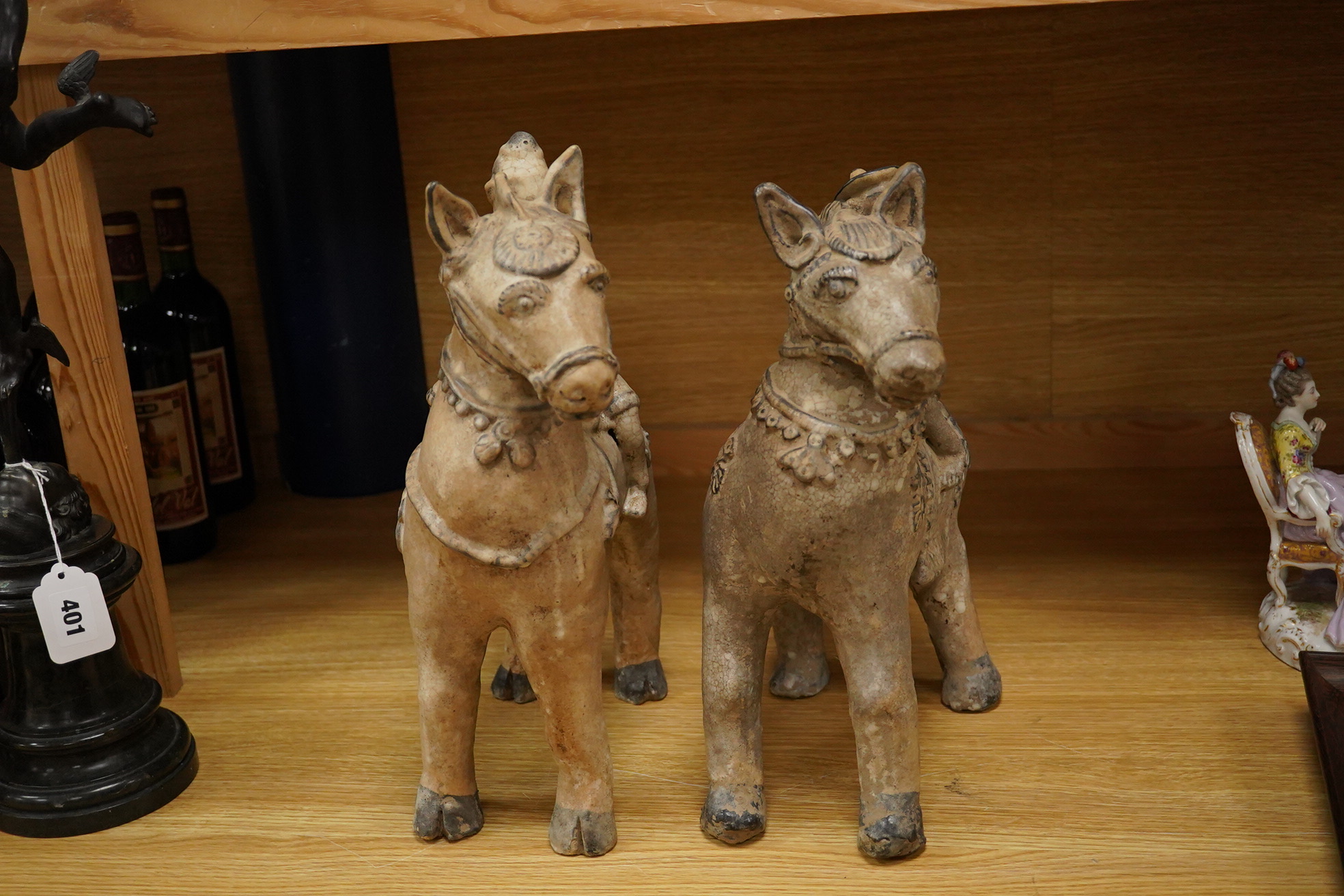 Two large Thai crackle glaze figures on horseback, 39cm high